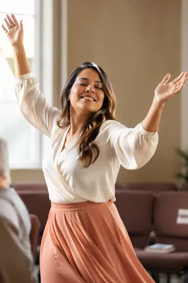 Joyful Woman Dancing in Soft Morning Light