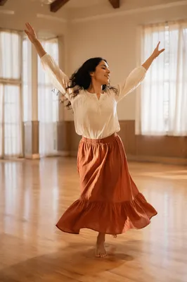Joyful Woman Dancing in Sunlit Hall