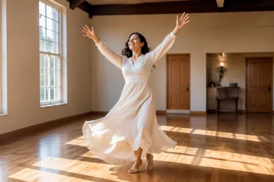 Joyful Woman Dancing in Sunlit Hall