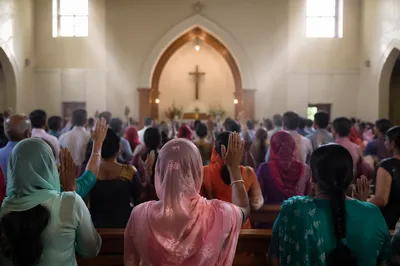 Indian Congregation in Sunlit Chapel