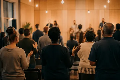 Diverse Congregation in Warmly Lit Hall