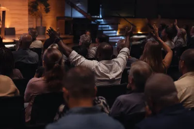 Diverse Congregation in Modern Worship Auditorium
