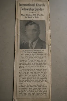 Aged Newspaper Clipping with Blurred Portrait