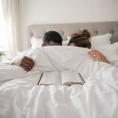 Interracial Couple Morning Bible Study at Home