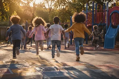 Children Playing Together on Sunny Playground