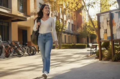 Confident College Student Walking on Campus