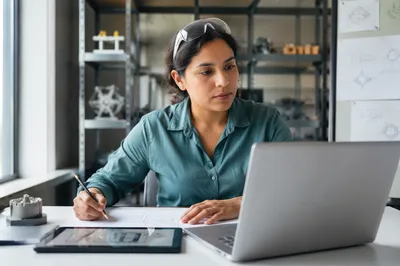 Focused Engineer at Modern Industrial Workstation