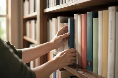 Librarian Returning Book in Quiet Reading Room