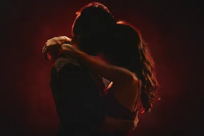 Romantic Couple Embrace in Warm Shadows