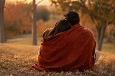 Romantic Couple Embracing in Autumn Park