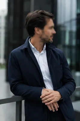 Casually Professional Man by Modern Office