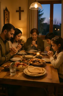 Middle Eastern Family Praying at Dinner Table