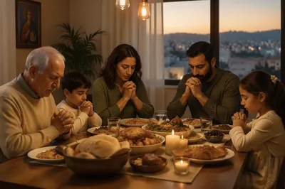 Family Praying Around Dinner Table at Dusk