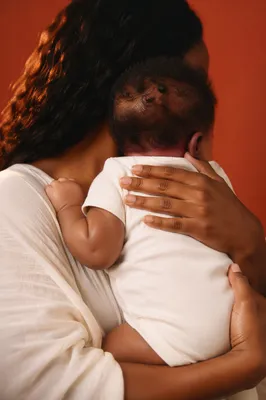 Tender Mother and Infant Embrace Portrait