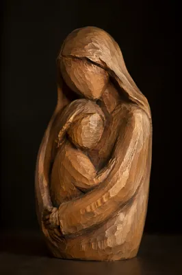 Tender Wooden Mother and Child Embrace