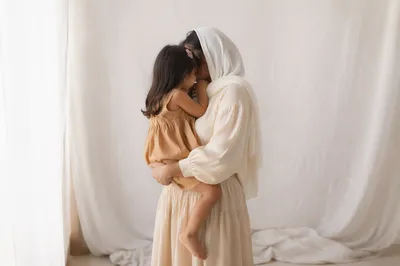 Tender Mother and Child Embrace in Soft Light