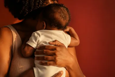 Tender Mother and Infant Embrace Portrait