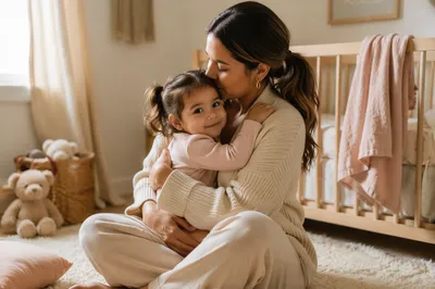Mother Holding Toddler in Sunlit Nursery