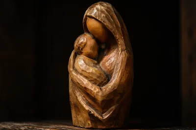 Tender Wooden Mother and Child Embrace