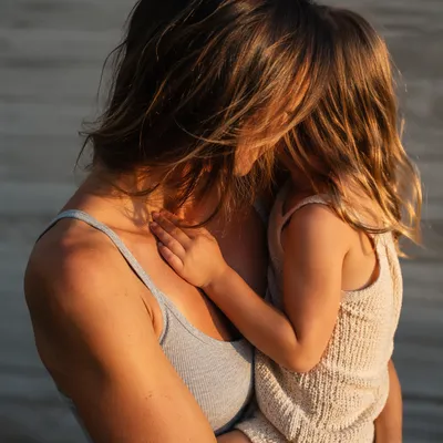 Mother and Child Hug in Warm Light