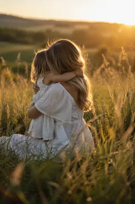 Mother and Child Embrace at Golden Hour