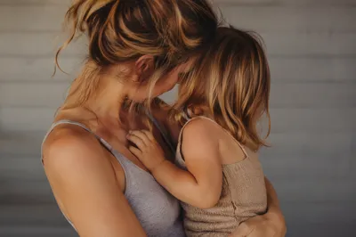 Mother and Child Embrace in Warm Light
