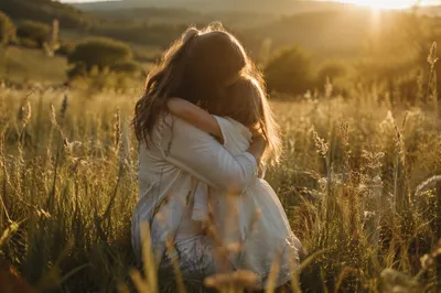 Mother and Child Embrace at Golden Hour