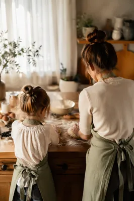 Mother and Daughter Baking in Warm Kitchen