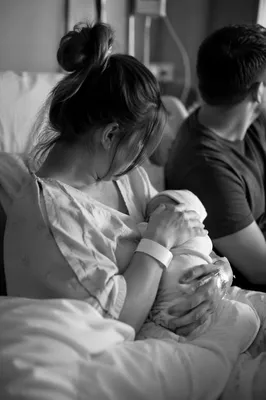 Tender Postpartum Mother and Newborn Hospital Scene