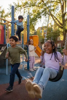 Diverse Children Playing at Neighborhood Playground