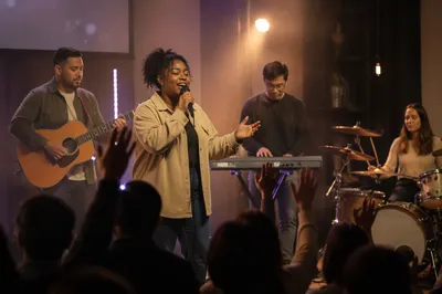 Diverse Music Team Performing on Stage