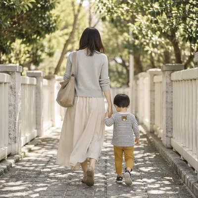 Parent and Child Walking Hand in Hand