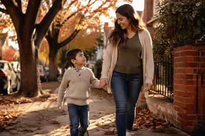 Mother and Son Walking Hand in Hand