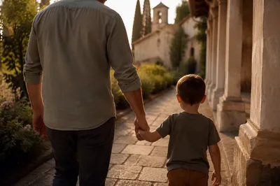 Parent and Child Walking by Chapel Garden