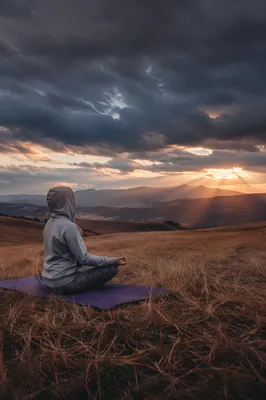 Peaceful Meditation in Golden Meadow at Sunset