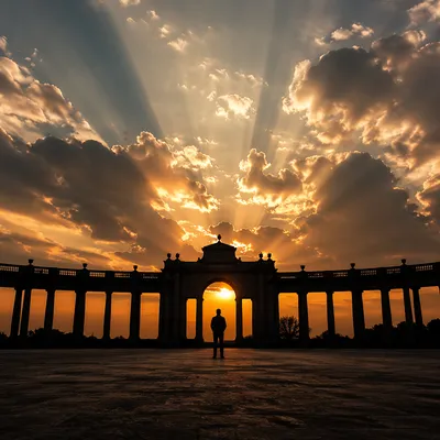 Silhouetted Person Before Sunset Colonnade