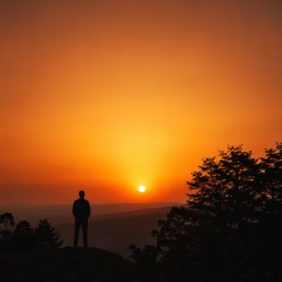 Lone Silhouette Before Dramatic Sunset
