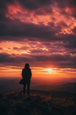 Lone Silhouette on Ridge at Sunset