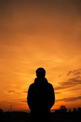 Dramatic Person Silhouette at Sunset Sky