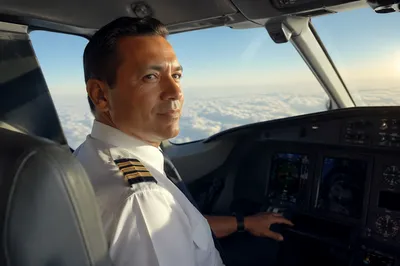 Commercial Pilot in Airplane Cockpit
