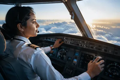 Pilot Viewing Clouds from Airplane Cockpit