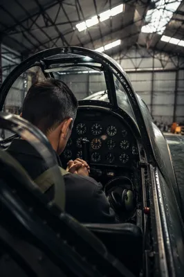 Pilot Praying Quietly in Cockpit Before Flight