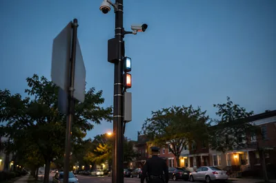 Police Officer Patrolling Quiet Neighborhood at Dusk