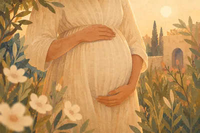 Pregnant Woman Cradling Belly at Golden Hour