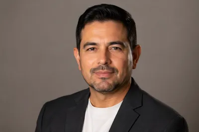 Confident Middle-Aged Man Studio Headshot