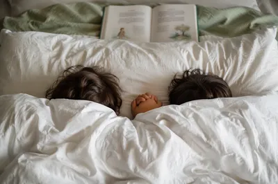 Siblings Praying Together at Bedtime