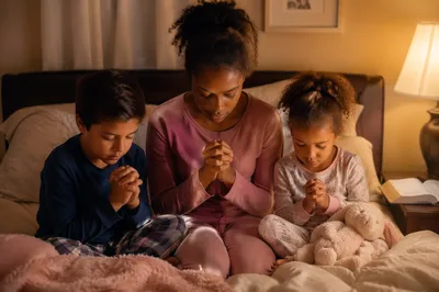 Three Siblings Praying on Bed at Night