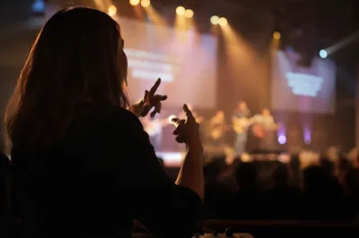 Sign Language Interpreter Beside Worship Stage