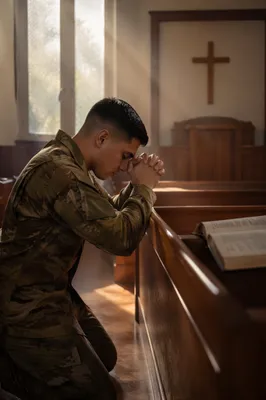 Soldier Kneeling in Prayer at Chapel Cross