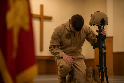 Soldier Kneeling in Prayer at Chapel Cross